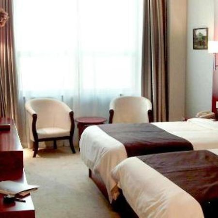 Hotel Rome Business Tianjin Zimmer foto